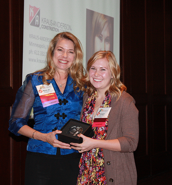 MNCREW Chapter President Mary Jo Kelly presented the award to Abigail Heimel