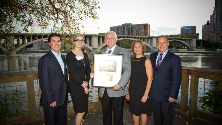 Group of people with award Women in Construction