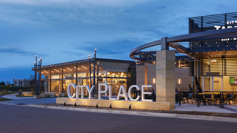 CityPlace Redevelopment Shopping Center Site Exterior Lit Sign in Front of Whole Foods