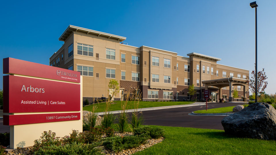 Ebenezer Arbors at Ridges Senior Assisted Living Exterior Entrance front of Building With Sign