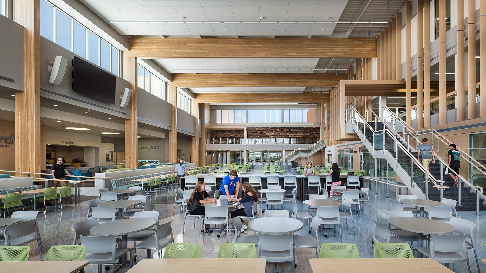 Alexandria High School Interior Cafeteria With Many Tables, Booths and Communal Seating