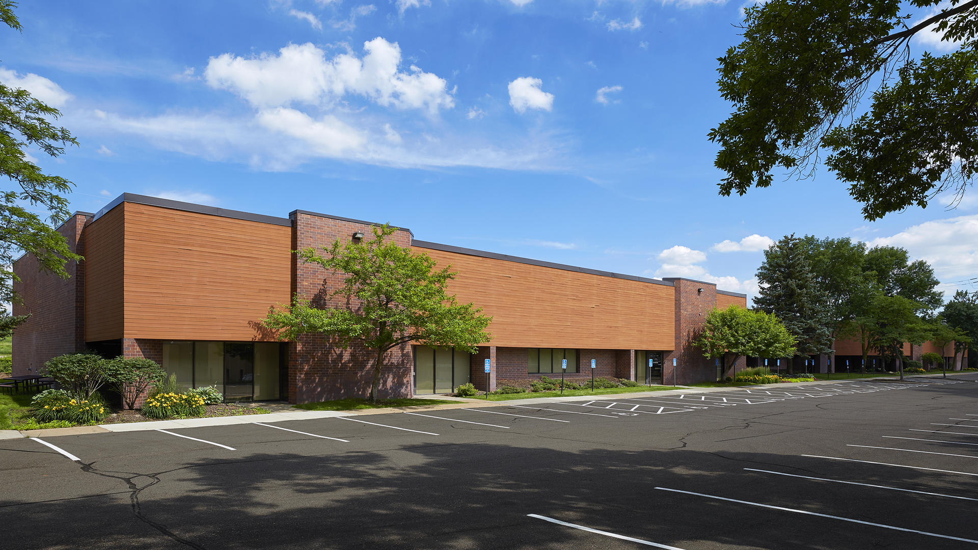 6301 Cecilia Circle Office Building exterior front of building with surface parking