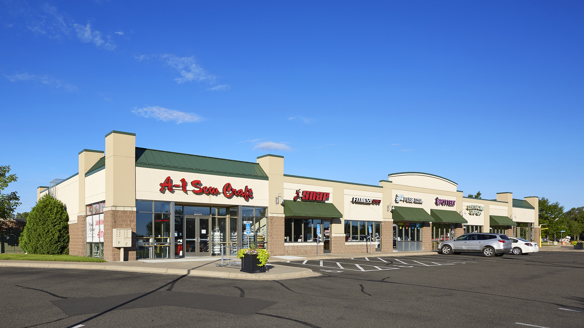 Hayden Lake Square Champlin MN retail shopping center exterior full view