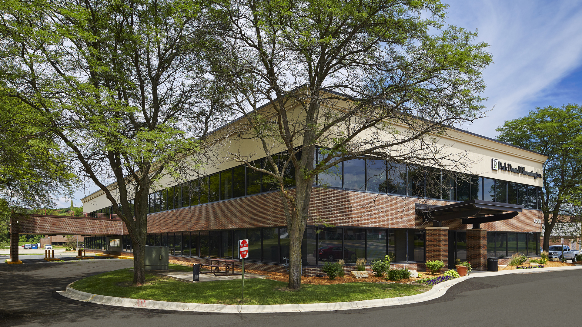 4200 W Old Shakopee Office Building View of Front and Side of Building Showing Entrance and a Drive Thru