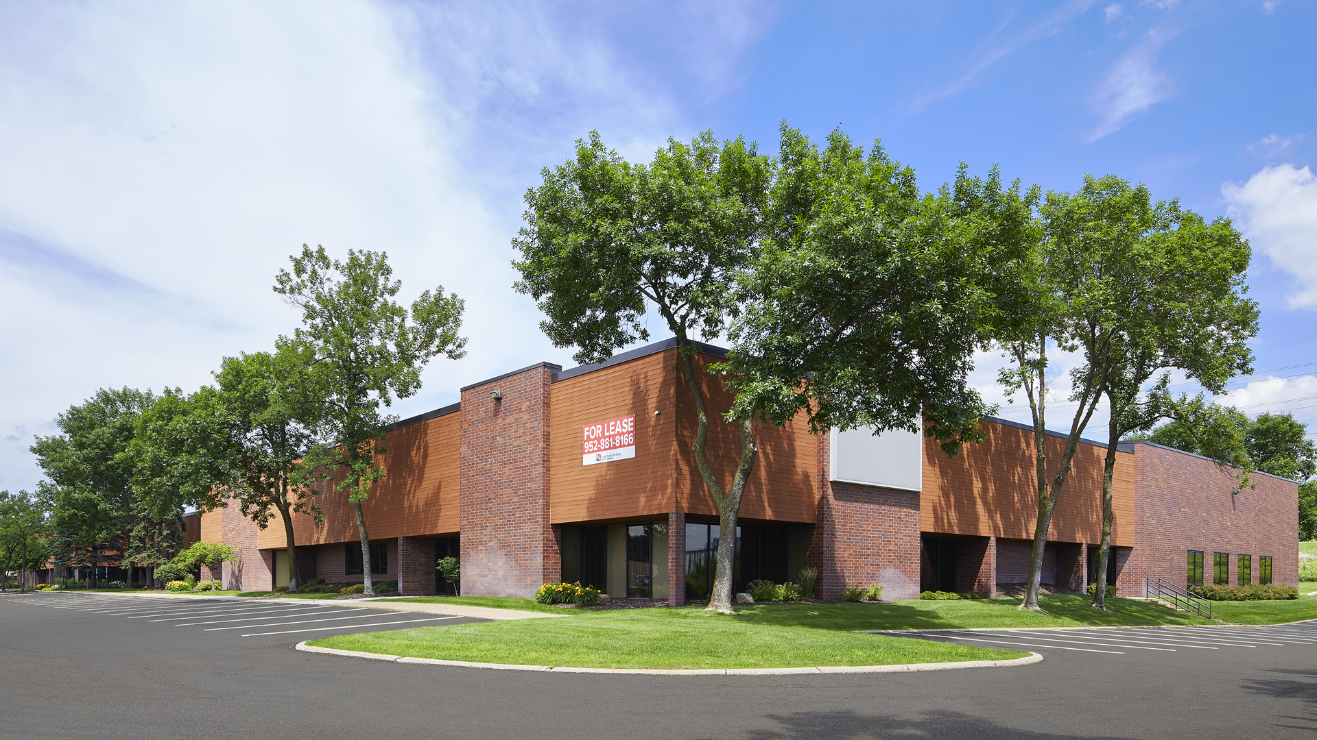 6301 Cecilia Circle Office Building exterior front of building with surface parking