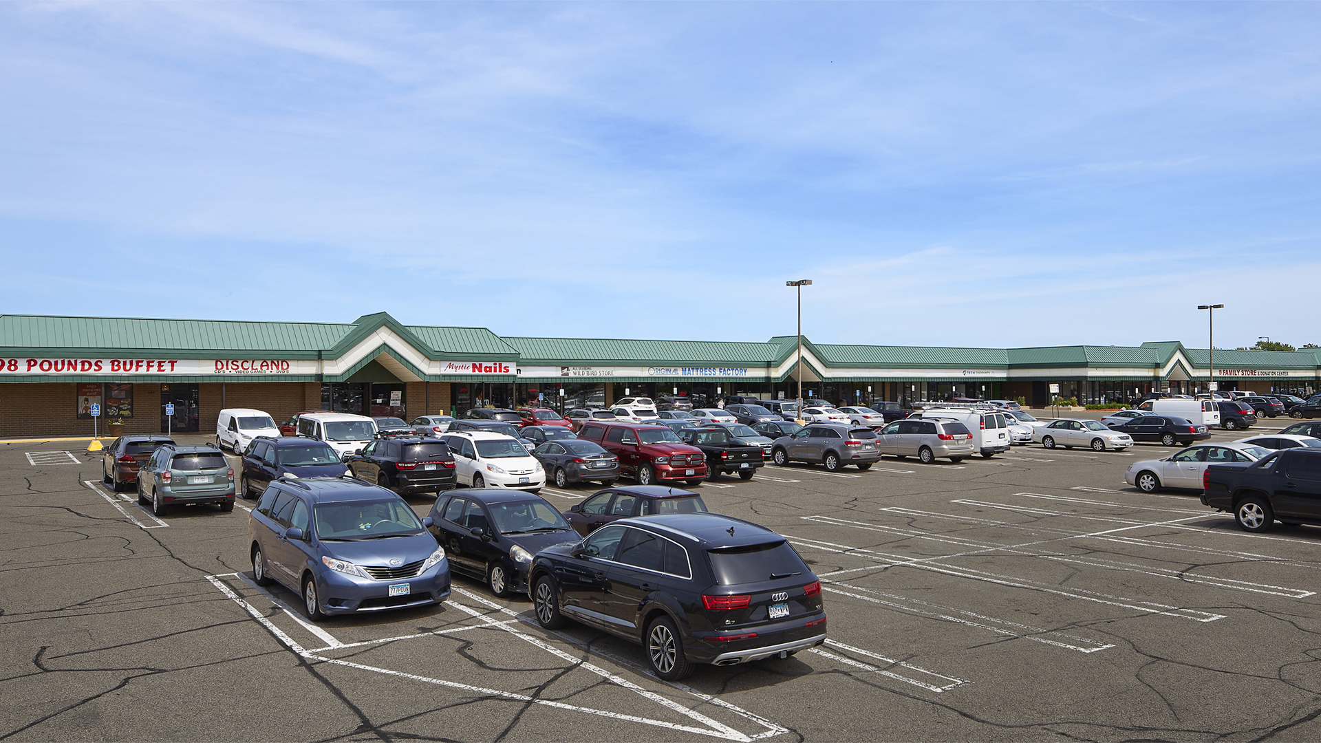 Clover Retail Shopping Center Strip Mall Front facing 98th St