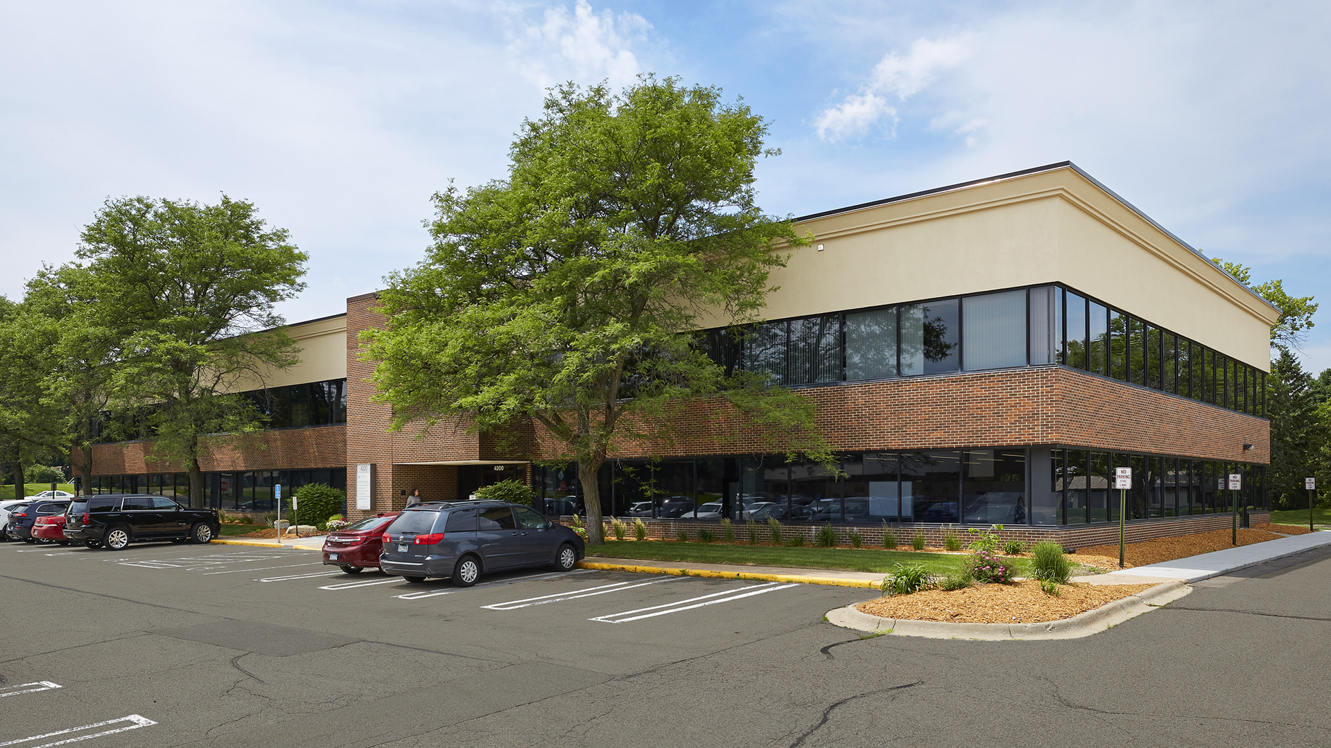 4200 W Old Shakopee Office Building Back Entrance and Surface Parking Lot