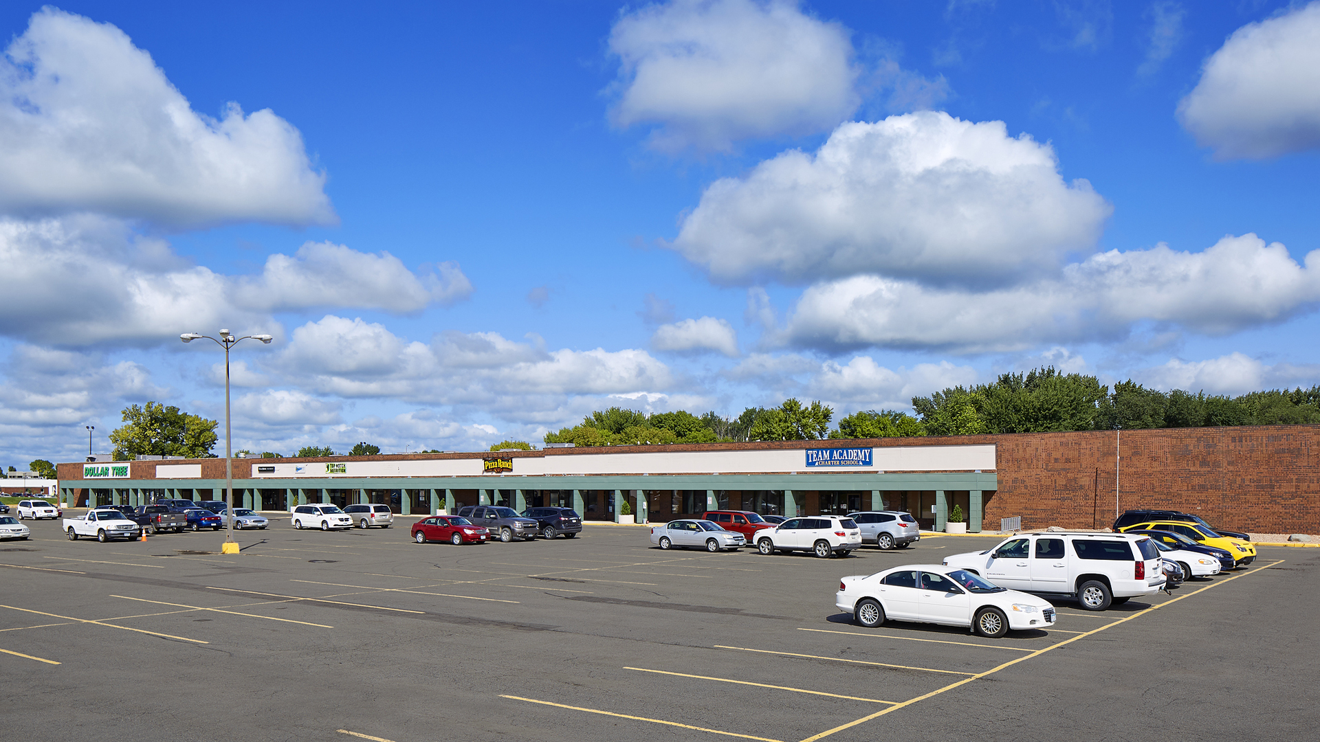 Northridge Plaza Retail Shopping Center Waseca MN exterior full strip mall view