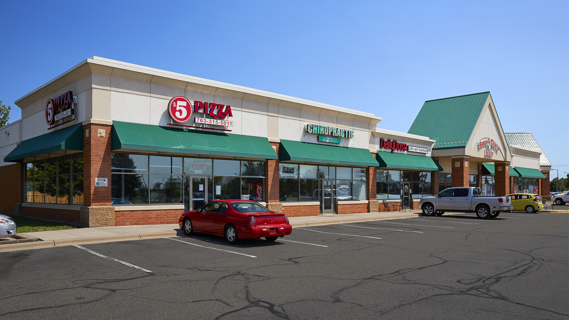 Pinebrook Centre Brooklyn Park MN retail strip mall exterior featuring 5 Pizza and Sweet Taste Italy