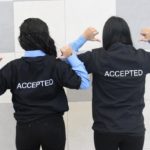 Two Cristo Rey students wearing 