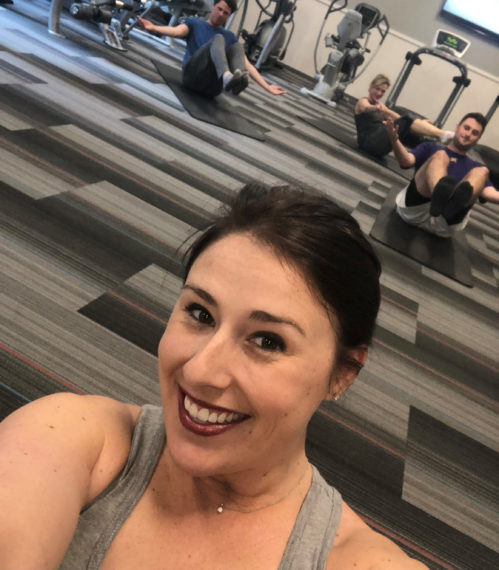 Bre Ostrom leading a fitness class. Wellness by Design Award