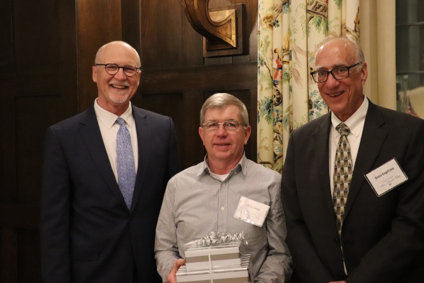 Al Gerhardt and Bruce Engelsma present the Silver Service award to Terry Smith