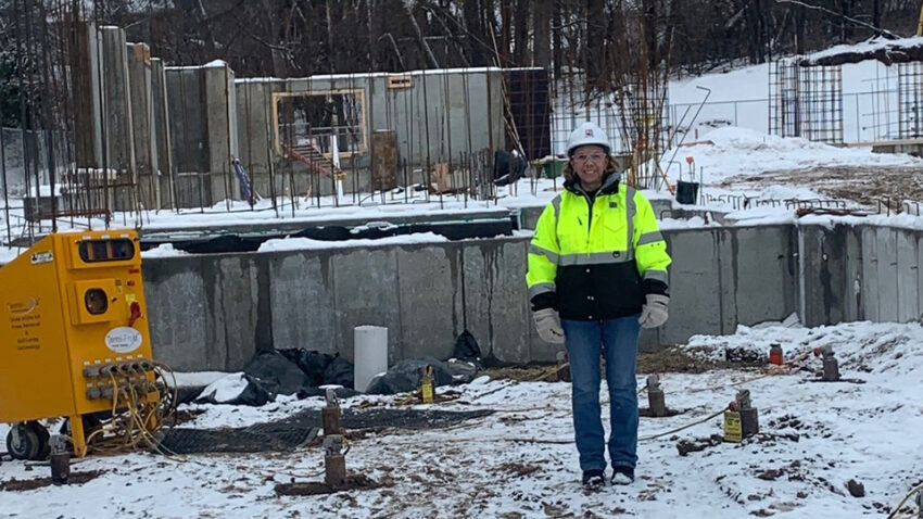 Project manager on job site in winter