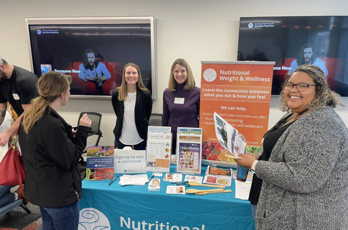 employees at a wellness booth