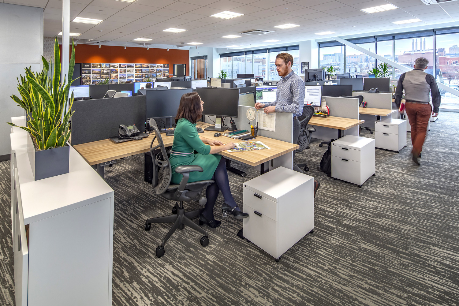 9,000 SF Class A office build out consisting of reception area, conference rooms, work cafe, design lab, work room, and open office areas