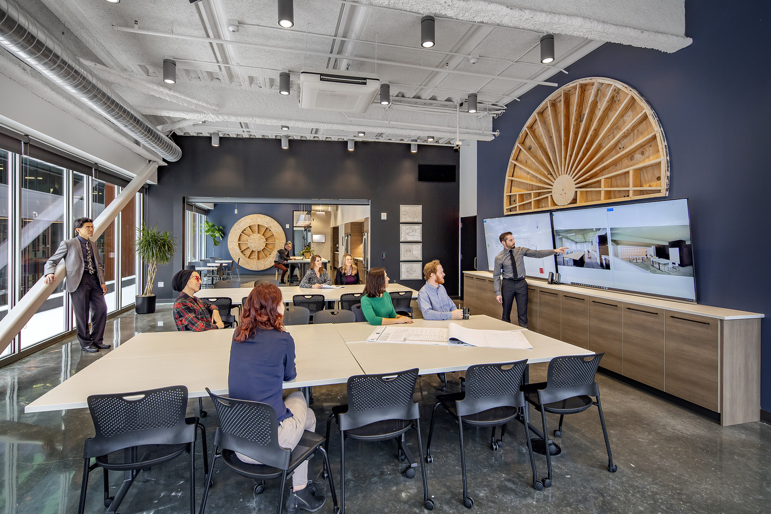 9,000 SF Class A office build out consisting of reception area, conference rooms, work cafe, design lab, work room, and open office areas