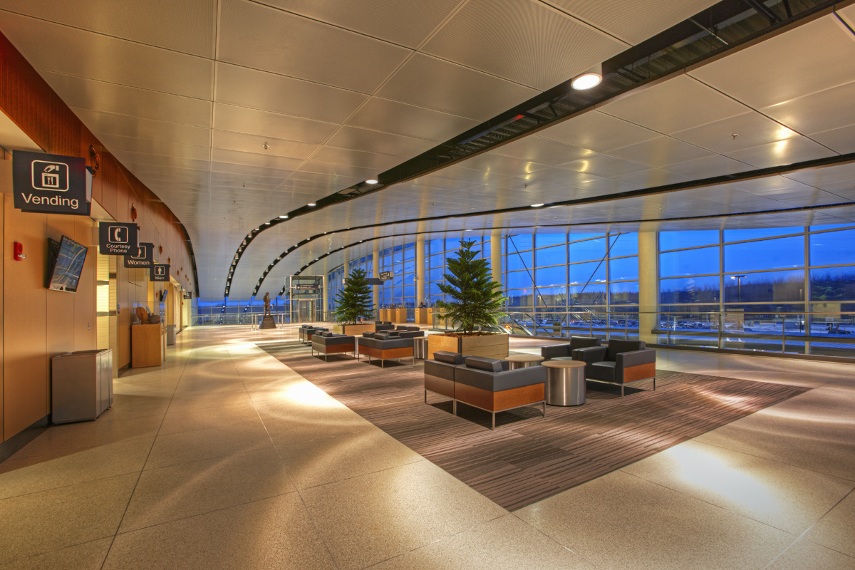 "114,000 s.f. new passenger terminal structure and enclosure, and associated sitework. Reynolds, Smith and Hill."