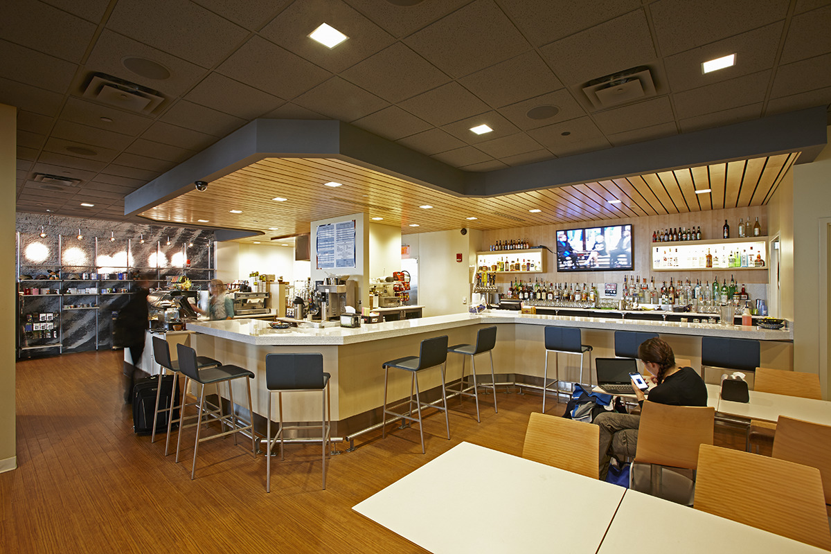 "114,000 s.f. new passenger terminal structure and enclosure, and associated sitework. Reynolds, Smith and Hill."