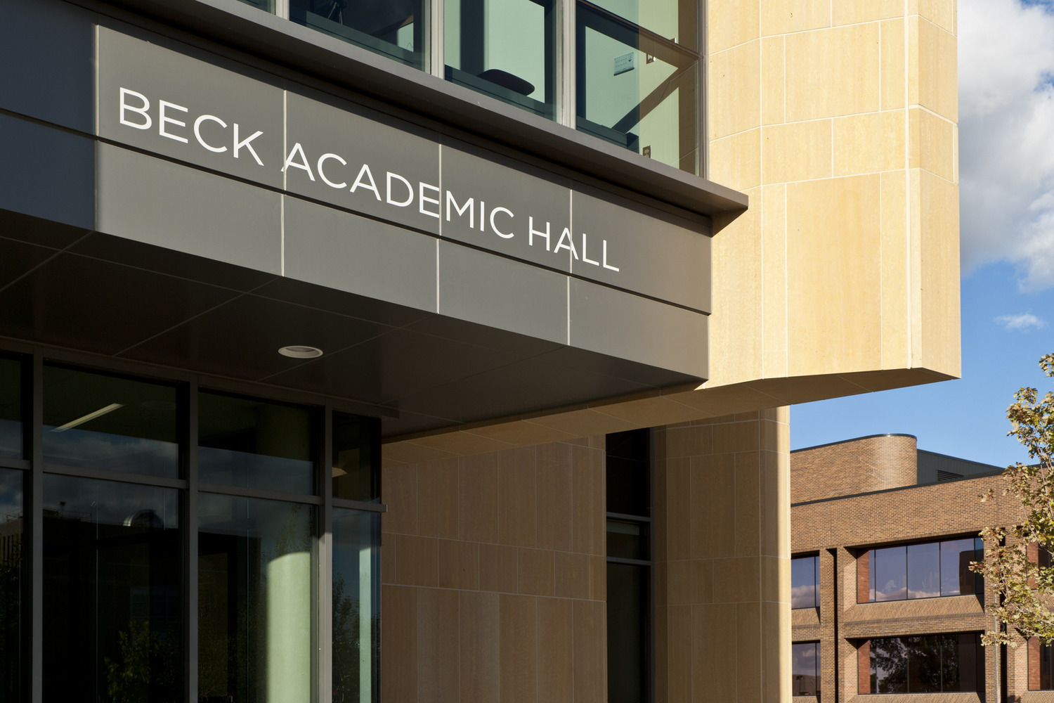 " 125,537 s.f./3-level (plus full basement) new academic building w/classrooms, lecture halls, computer rooms, large public atrium & faculty offices"