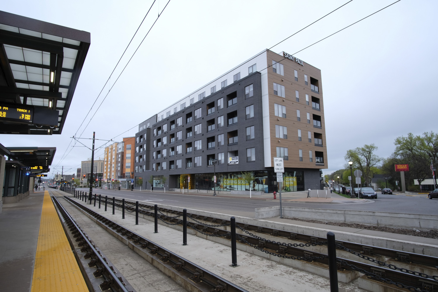 345,482 SF, 248-unit wood framed apartment with precast structure parking