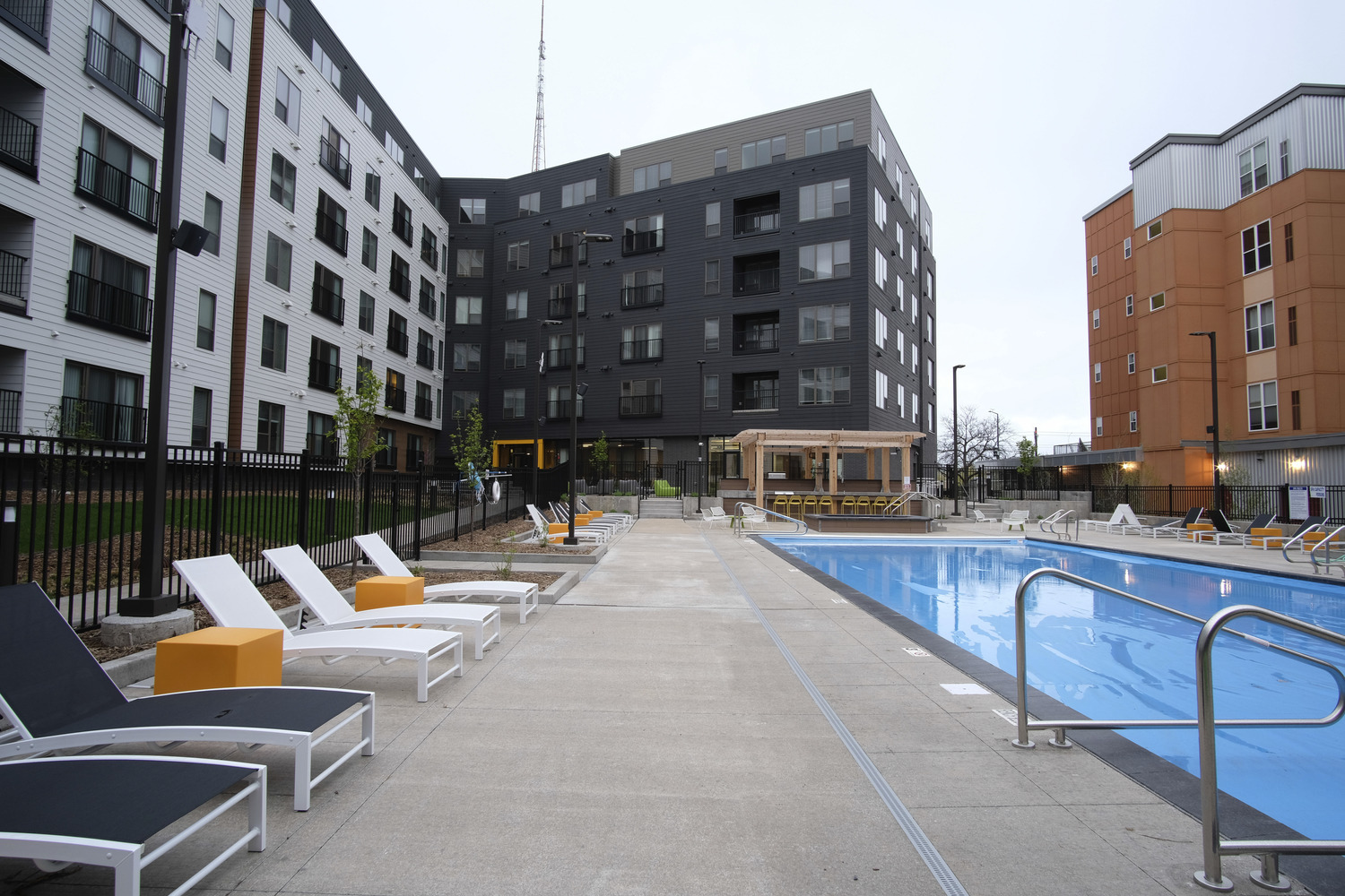 345,482 SF, 248-unit wood framed apartment with precast structure parking