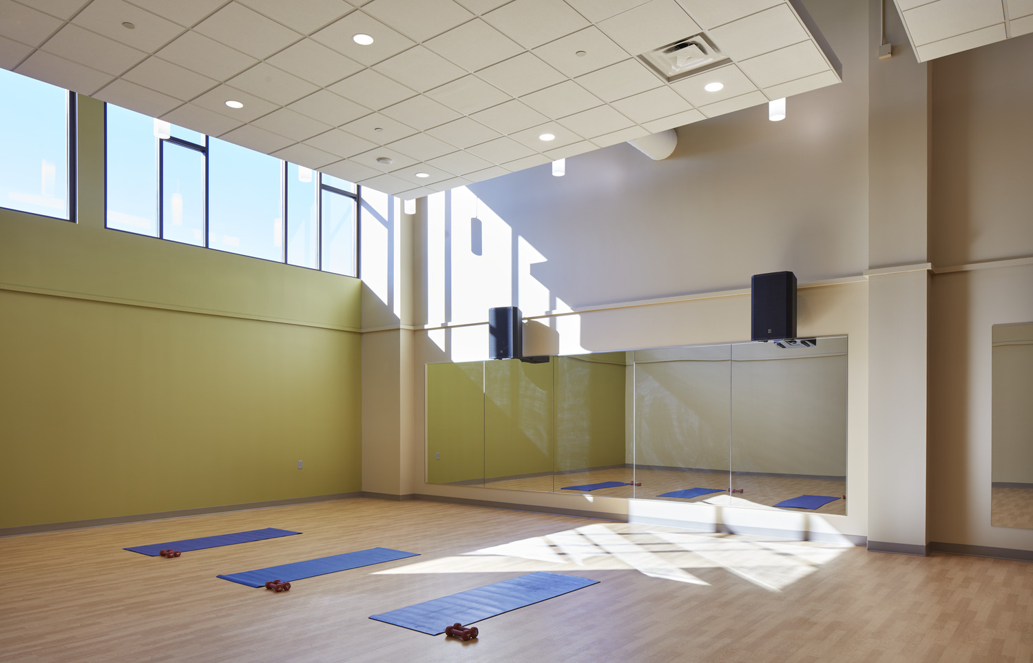 70,000 SF, 2-story renovation and addition to existing recreation center including a new entrance, a 50M pool, and a 50,750 SF new senior center