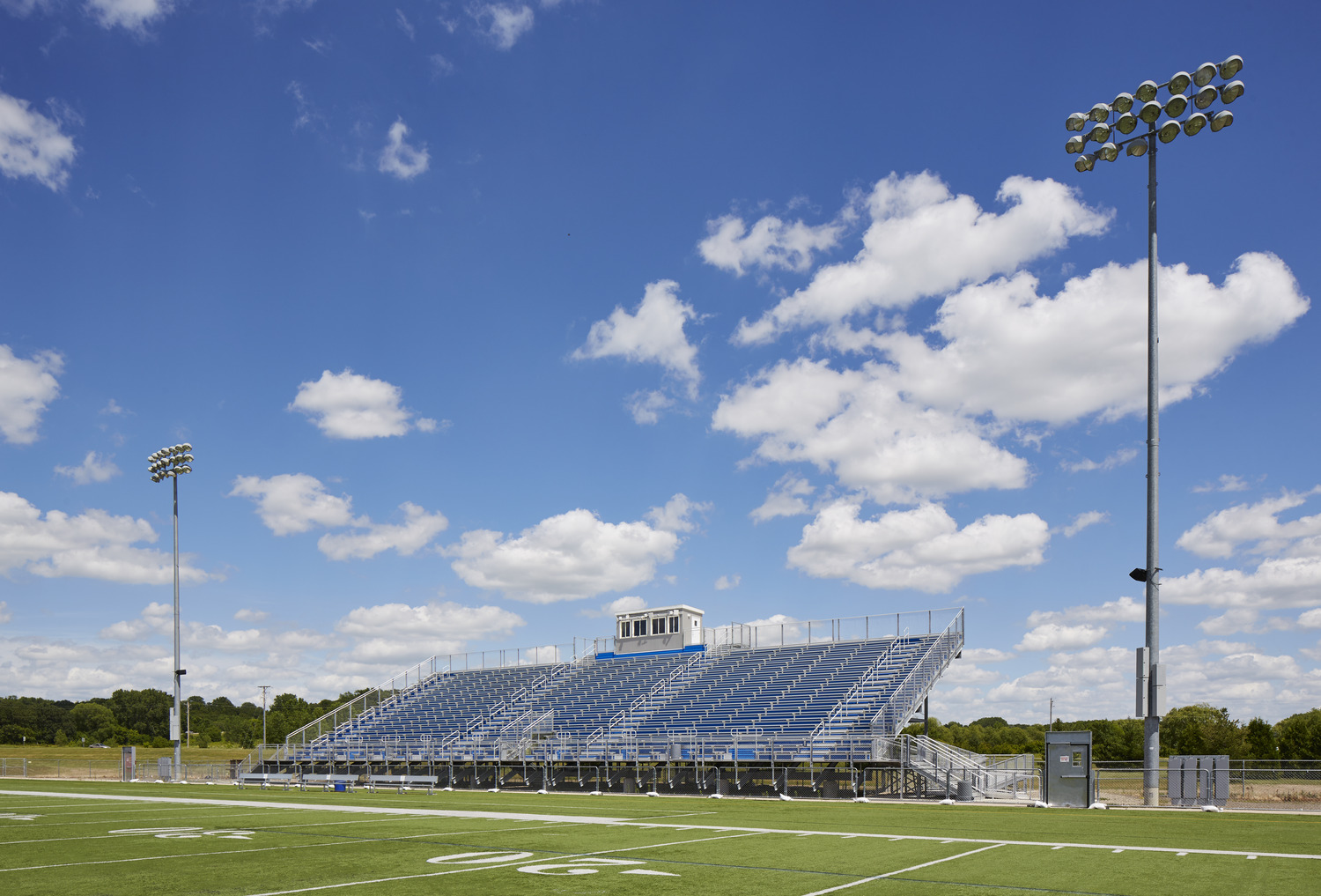 6,000 SF new stadium building erected within existing stadium, new stadium bleachers, and 1,800 SF stadium entrance building, expansion of home side stadium seating to 3,500 seats, new ticketing building with restrooms, and new locker rooms