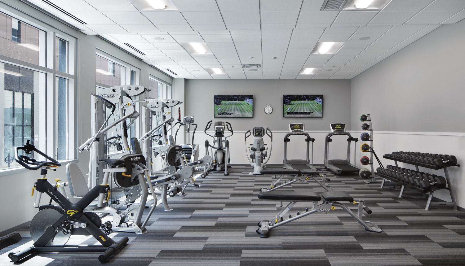 This is a new five-story 102,886 square-foot headquarters for Kraus-Anderson. In 2015 we announced plans to consolidate our Twin Cities operations under one roof in a new, build-to-suit LEED facilty. The new headquarters will house approximately 300 employees, doubling the size of teh current downtown staff with room for future expansion on the site. The new building will foster a highly collaborative environment with leading edge technology.Amenities include a fitness center, educational training center, rooftop deck, cafeteria, formal and informal meeting areas, and an appealing, well-landscaped exterior. The plan also includes two levels of underground parking to serve our employees.