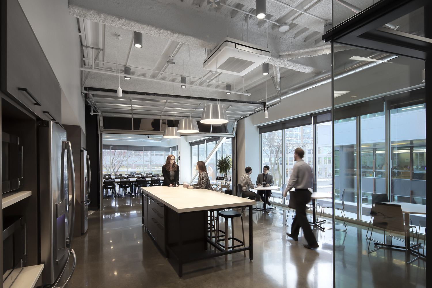 9,000 SF Class A office build out consisting of reception area, conference rooms, work cafe, design lab, work room, and open office areas