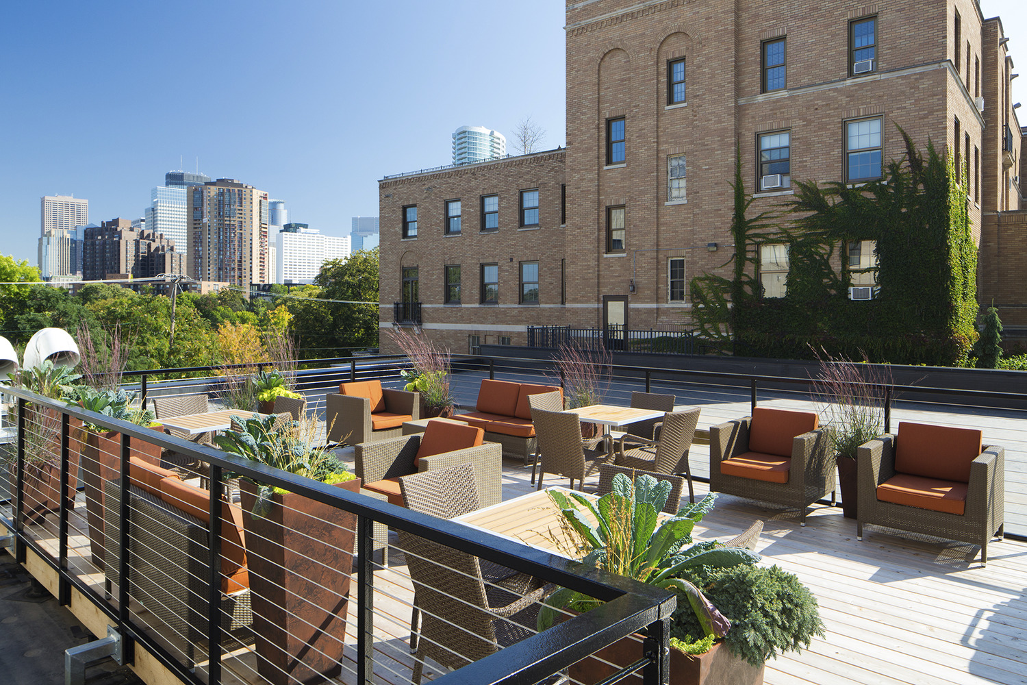 "430 Oak Grove is a project that is owned and managed by Kraus-Anderson. Kraus-Anderson originally built the building for Northwestern National Life Insurance in 1923. In 2011, KA purchased the building and managed all aspects of the development. KA managed the acquisition, historic designation, City and State entitlements, procurement of grants (asbestos abatement), hiring of ESG Architects as the design team, market studies, feasibility analysis, construction budgeting, financing options and procurement, leasing, etc.  430 Oak Grove is located in the highly attractive Loring Park Neighborhood. Kraus-Anderson constructed 72 units: 8 studio, 43 one bedroom, 2 one bedroom plus den, 17 two bedroom, and 2 live/work units. There is a rooftop patio for enjoying the views of downtown and the park for all of the residents.  The rooftop deck has gas burning grills, a fireplace/fire pit, tables, lounge chairs, and other fine amenities.  There is a second floor common area that has skylights and forms an interior courtyard. This common area has a large fireplace, numerous seating areas, a business center, recreational activities such as billiards, a wet bar with refrigerator and decorative artwork.  On the first floor, there is a fitness center/spa/yoga center. The area is entirely self-service. The first floor also has units, a management office, and storage spaces.  The basement was converted into underground parking, bicycle storage and other storage. A one level parking deck contains 88 parking stalls."