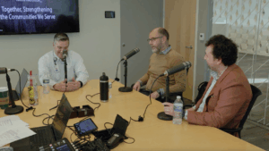 3 men talk on microphones about facility condition assessment