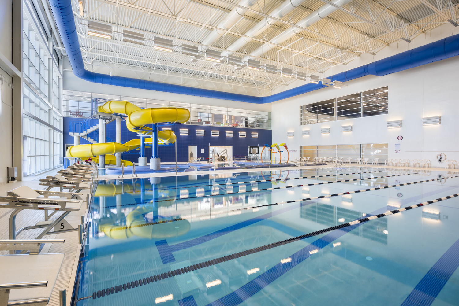 262,000 SF new events center including a hockey/ice arena (2 sheets of ice), a sports arena/field house, aquatic center with competitive pool, convention center, a basketball arena, and administrative/support areas